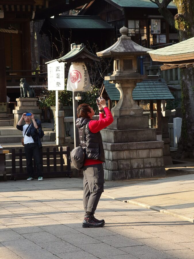 Gojoten Shrine in Ueno Park surrounded by cherry blossoms